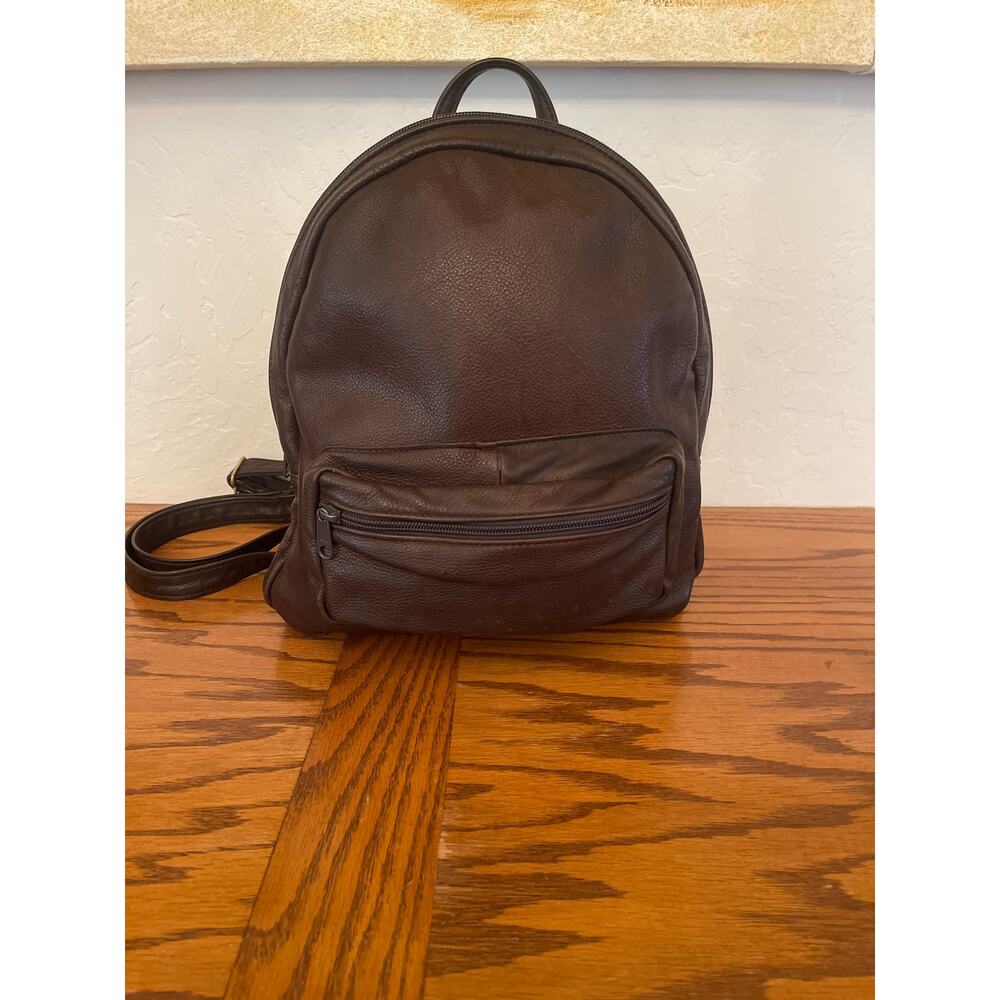 Vintage Victoria Leather Co. Brown leather backpack.